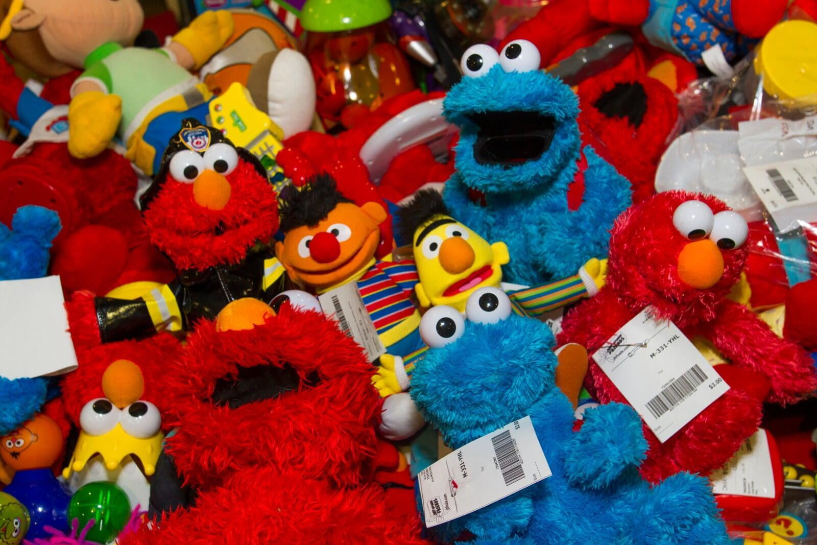 Sesame Street characters on a table.